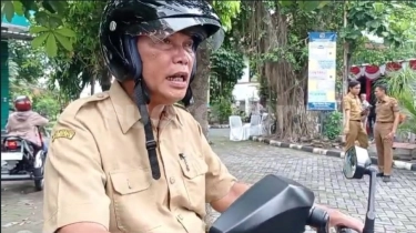Beda dengan Gibran, Ini Momen Wakil Wali Kota Solo Pilih Naik Motor Listrik Saat Tugas