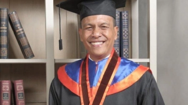 Kombes. Pol. Dr. Helmi Kwarta Kusuma Putra Rauf, S.I.K., M.H.