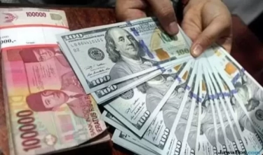 Rupiah Melemah ke Level Rp 16.256 Dipicu Sentimen Hawkish The Fed hingga Ketidakpastian Kebijakan Trump