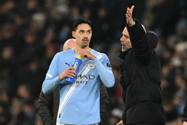 Pep Guardiola Isyaratkan Manchester City Belum Menyerah Kejar Arsenal