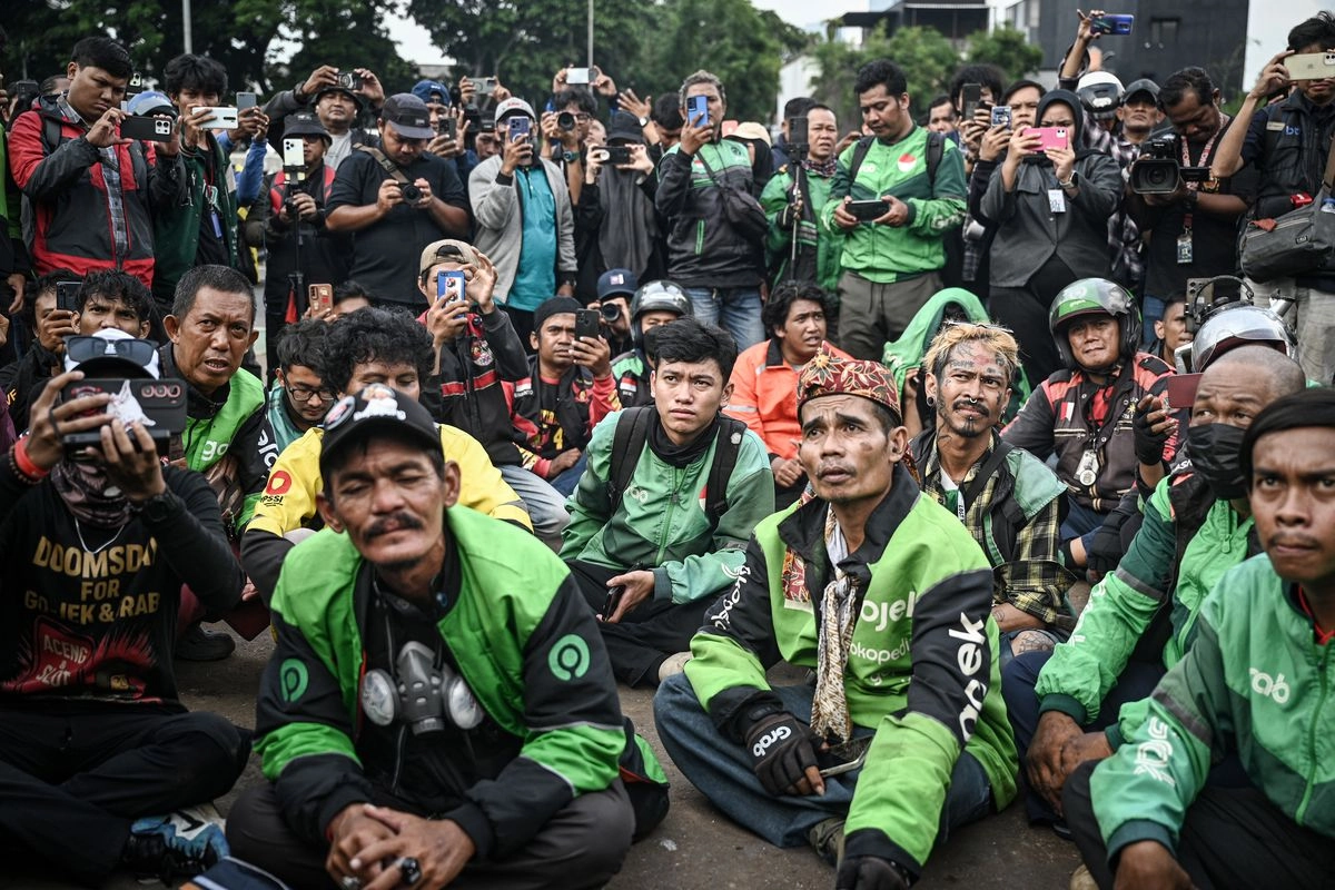 Paradoks Ekonomi Gig: Intervensi Negara Mengangkat Harkat Ojol